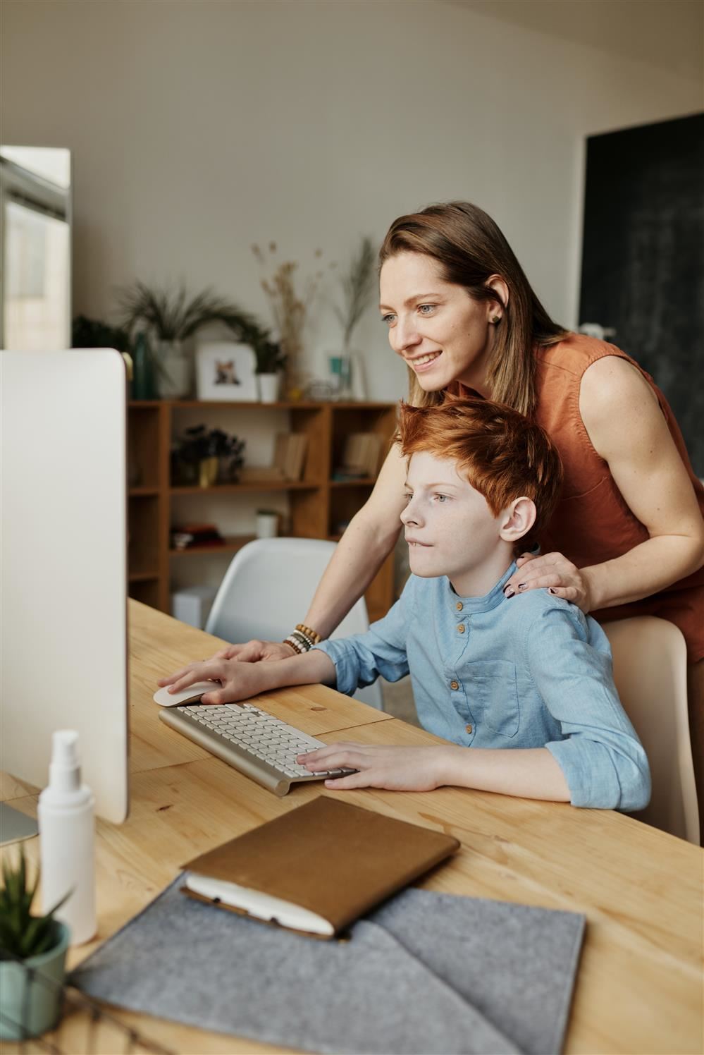 image of parent and child at a computer